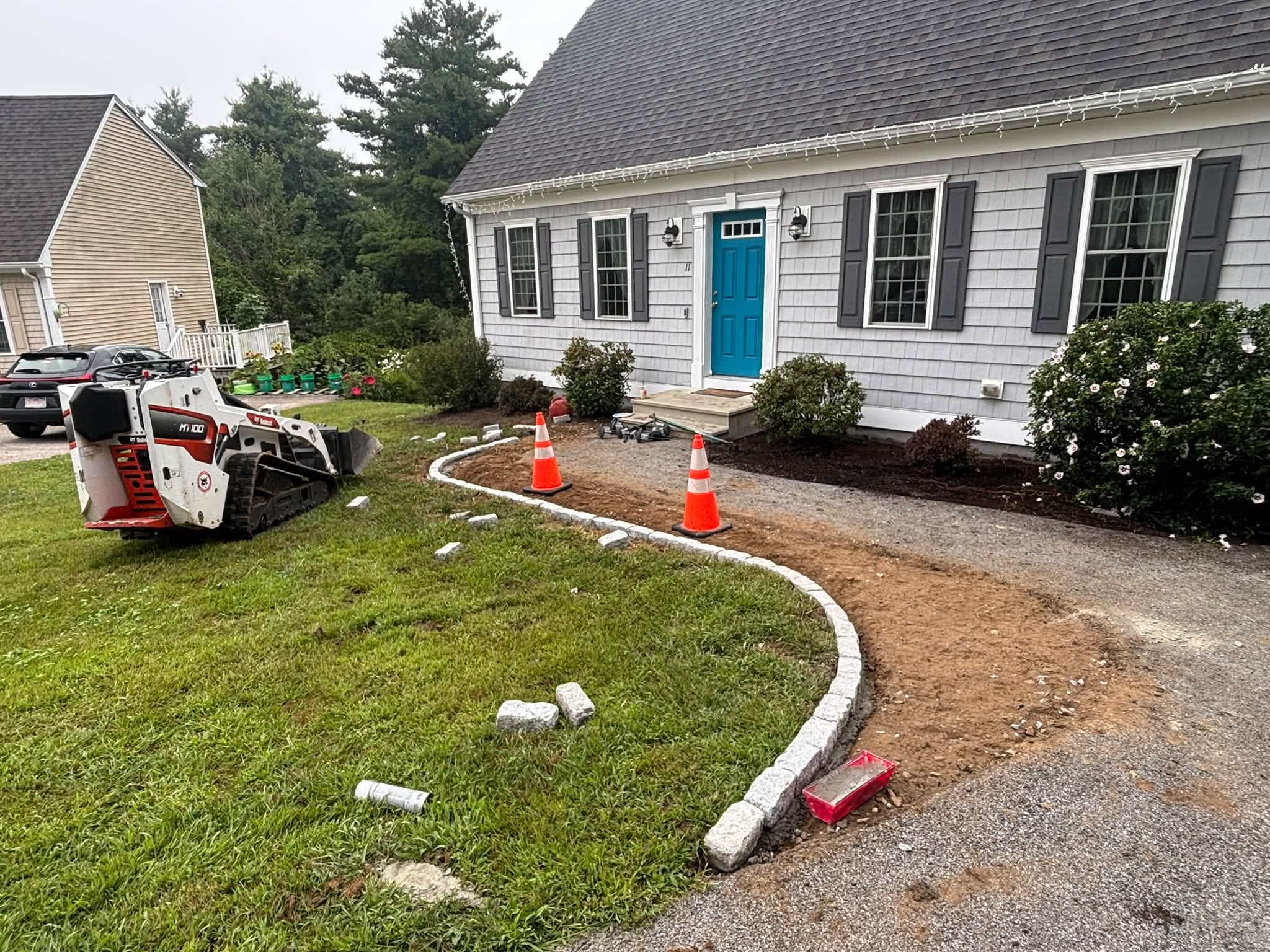 Excavation and base prep for cobblestone border — Spencer, MA